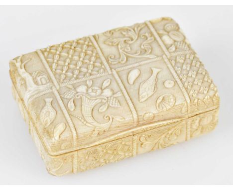 A late 18th/19th century marine carved ivory snuff box of rectangular form, carved with marine life, cornucopia and landscape