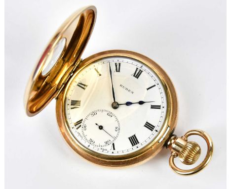 A gold plated crown wind half hunter pocket watch with white enamel dial set with Roman numerals and subsidiary seconds hand 