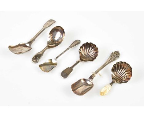 WILLIAM ELEY; a William IV hallmarked silver caddy spoon in the Fiddle pattern, London 1810, two further caddy spoons, one ex