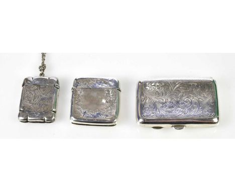 J&amp;R GRIFFIN; a George V hallmarked silver cigarette case with chased scrolling decoration surrounding the vacant cartouch