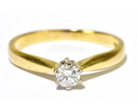 An 18ct yellow gold diamond solitaire ring, the six claw set round brilliant cut stone approx. 0.20cts, size R, approx. 3.2g.