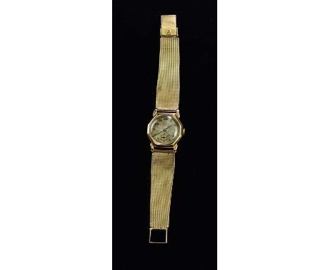 An early 20th century gentleman's 9ct gold cased wristwatch, the hexagonal face set with engine turned circular dial with Ara