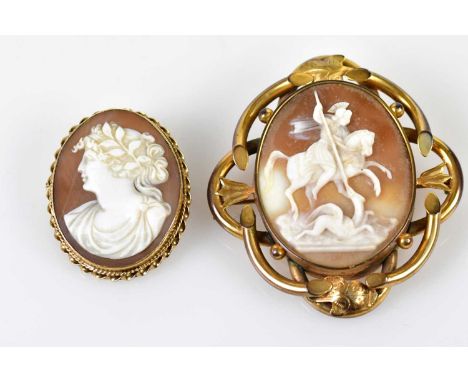 A large Victorian yellow metal framed cameo brooch depicting George and the Dragon, 70 x 65mm, and a further oval cameo in 9c