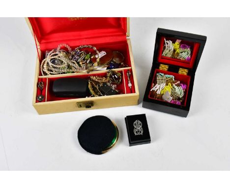 A small collection of assorted costume jewellery, including mourning ring, various brooches, compacts, etc.