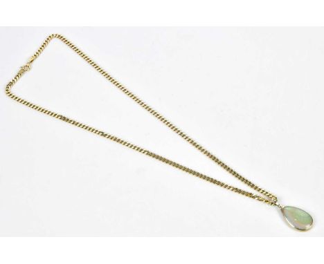 A 9ct yellow gold flat link chain supporting an opal teardrop shaped pendant, length of chain 50cm, length of drop including 