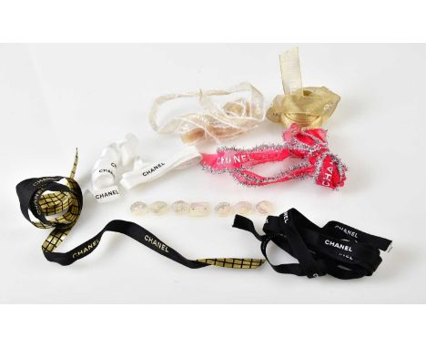 CHANEL; six pearlised plastic buttons with 'Chanel Paris' to top, with a further square button, and a small collection of Cha