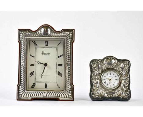 HARRODS LTD; an Elizabeth II hallmarked silver mounted mantel clock, with gadrooned decoration, Sheffield 1992, and a smaller