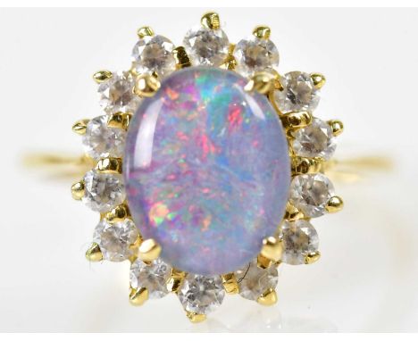 An 18ct yellow gold doublet opal and diamond set oval cluster ring, size L, approx 4g.N.B. The ring head length 14.4mm.