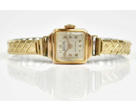 ORLUX; a manual wind lady's wristwatch, stamped 18k.