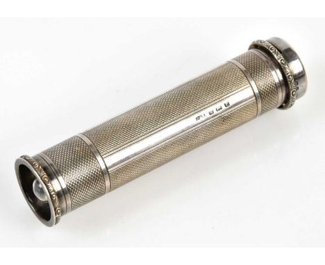 CRISFORD &amp; NORRIS; a George VI hallmarked silver cased torch with engine turned case, Birmingham 1939, length 11cm.