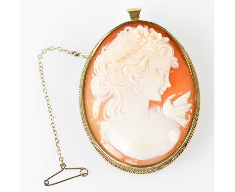 A 20th century oval cameo portrait brooch set in 9ct yellow gold frame with pendant loop attachment, 50 x 40mm.