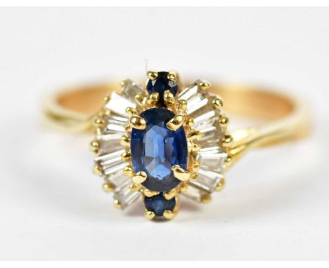 A yellow metal sapphire and diamond cluster ring, size P, approx. 3.8g.