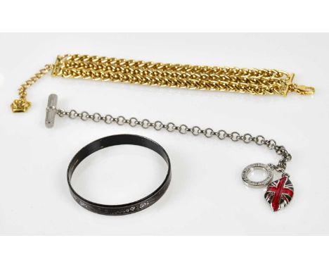 LULU GUINNESS; a silver tone chain charm bracelet, with Union Jack lips charm in red, silver and blue, a Butler &amp; Wilson 
