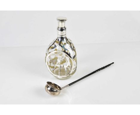 JOHN HAIG; a white metal mounted dimple decanter decorated with thistles with hallmarked silver stopper, also a white metal t