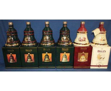 6 Bell's Extra Special Old Scotch Whisky Christmas Decanters 1992, 1993, 1994, 1995, 1996, 1997, all sealed and in original b