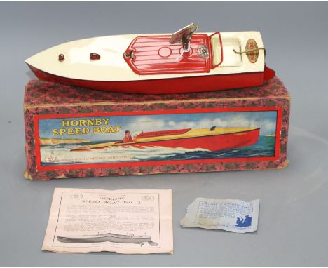 A Hornby tinplate clockwork No.2 'Swift' model speedboat, with red hull, boxed Condition: Some typical small losses to the en