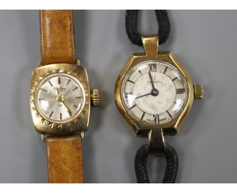 A lady's 1940's 9ct gold Omega manual wind wrist watch and a later lady's Bertina 9ct gold manual wind wrist watch, both on l