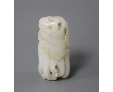 A Chinese jade carving of a finger citron, length 5.5cm, width 2.5cm, depth 2cm Condition: some natural staining within the s