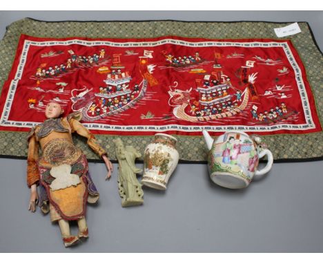 A small Cantonese porcelain teapot, a Satsuma vase, a silkwork panel, a doll and a broken soapstone figure Condition:- teapot