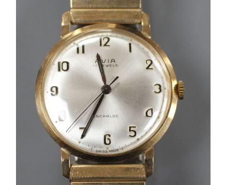 A gentleman's 1960's 9ct gold Avia manual wind wrist watch, on a gold plated strap, with Avia box. Condition: Watch ticks whe