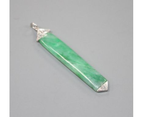 A 1920's style white metal mounted, jade and diamond pendant, overall 38mm, gross weight 1.7 grams. Condition: A couple of ti