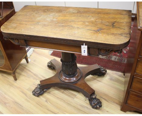 A Victorian rosewood folding card table, W.91cm D.45cm H.72cm Condition: The top is marked throughout, the lions paw feet are