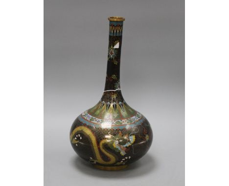 An early 20th century Chinese cloisonne vase, decorated with dragons on a black ground, height 38cm Condition: A little dirty