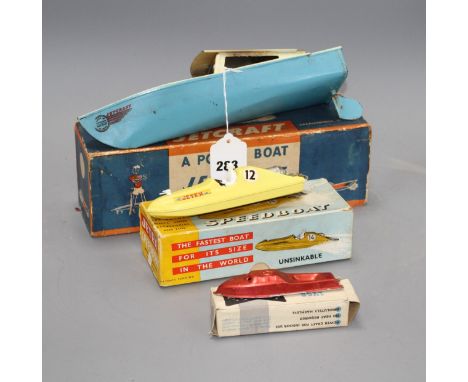 A boxed Jetex plastic fuel propelled model boat, a Jetcraft tinplate burner propelled model power boat and a boxed Mechanex p