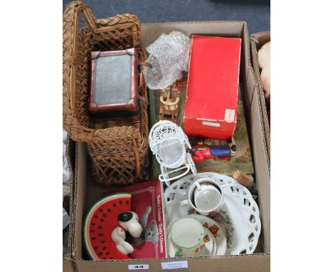 A box of items including Victorian books, a wicker reddy sofa and a Snoop watermelon money box c.1960s