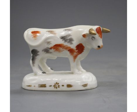 A Staffordshire porcelain figure of a standing bull, c.1830-40, fine crazing, both ears and horns restored, L.9.5cmProvenance