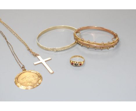 A late Victorian 9ct gold bracelet (dented), an 18ct gold three stone ring( stone missing), a 14k pendant on gilt chain, a ye