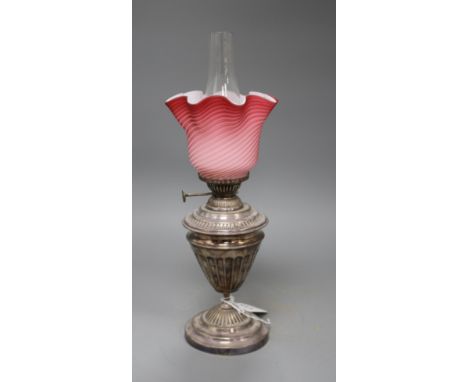 An Edwardian silver plated oil lamp by S. Hinks &amp; Son of Birmingham, with coloured glass shade, overall height 36cm Condi