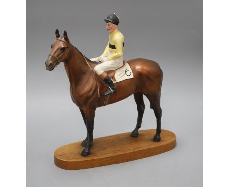 A Beswick model of Arkle with Pat Taaffe up, overall height 32cm Condition: Reins have broken, both front legs have been brok