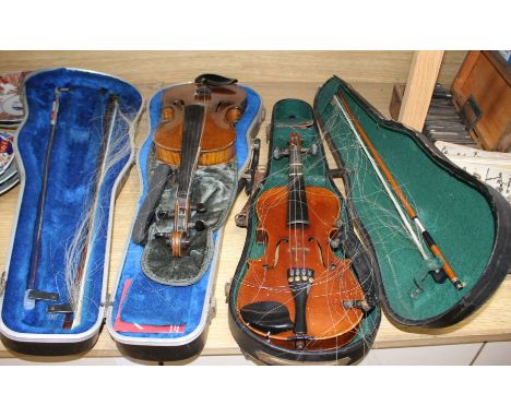 A violin with two piece back and bow, and a child's violin with bow, both with cases Condition:- main violin heavily worn fro