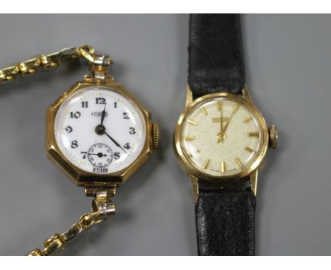 Two lady's gold manual wind wrist watches, Tissot 14ct and Hirco 9ct, on leather and gold plated flexible strap, respectively