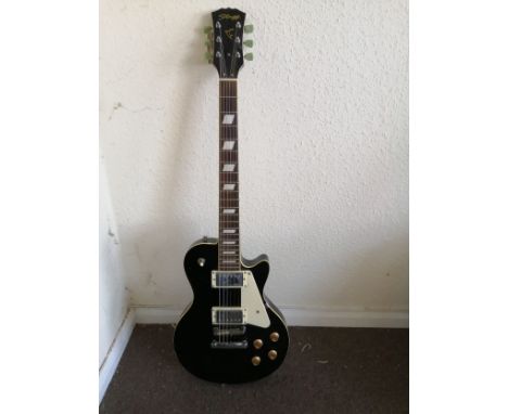 A Stagg Les Paul style electric guitar Condition: Electrics all working, some rust around selector switch and bridge, some ch