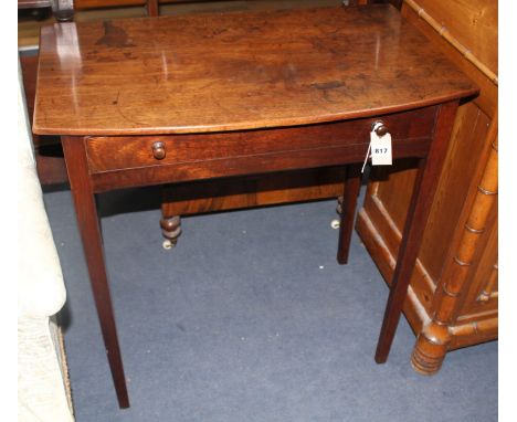 A late George III mahogany bowfront side table, with single drawer on squared legs, W.76cm D.45cm H.76cm Condition: Overall o