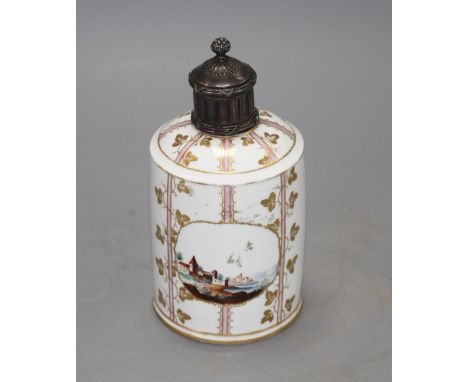 A late 18th century Hochst tea caddy, decorated with a town and ruins in a landscape, reserved against a gilt striped pink gr