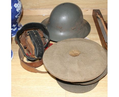 A WWII steel helmet, a Royal Gloucestershire Hussars cap, a Scots Guards? cap, three leather items and a Union Jack Condition