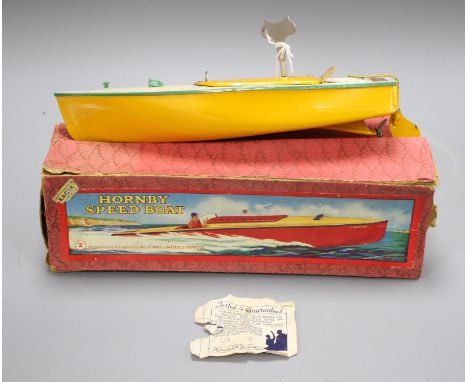 A boxed Hornby tinplate clockwork 'Swift' speedboat no.2, with yellow hull Condition: The model has some occasional flaking t