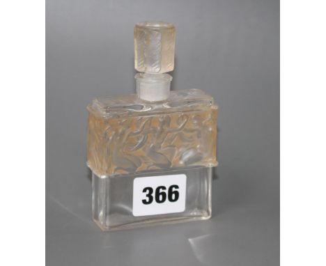 A Lalique for Molinard frosted glass scent bottle, decorated with a band of nudes, height 11.5cm Condition: Very good conditi