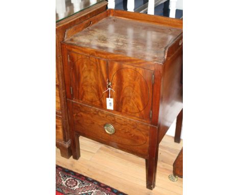 A George III mahogany tray top commode, W.56cm D.50cm H.84cm Condition: Overall of even mid brown mahogany tone but the top h