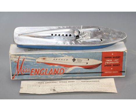 A Victory Industries 'Miss England' aluminium twin jet propelled speedboat, with original box and instructions Condition: The