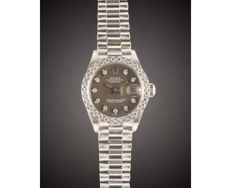 
A LADIES 18K SOLID WHITE GOLD &amp; DIAMOND ROLEX OYSTER PERPETUAL DATEJUST BRACELET WATCH
CIRCA 1977, REF. 6917 WITH "CAPPU