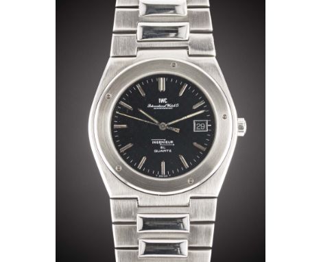 A GENTLEMAN'S STAINLESS STEEL IWC INGENIEUR SL "JUMBO" QUARTZ BRACELET WATCH
CIRCA 1980, REF. 3303 WITH BLACK "WAFFLE" DIAL, 