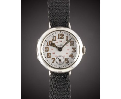 A GENTLEMAN'S SOLID SILVER OMEGA "OFFICERS" WRIST WATCH
CIRCA 1918, WITH 24 HOUR PORCELAIN DIAL &amp; CATHEDRAL HANDS
Movemen