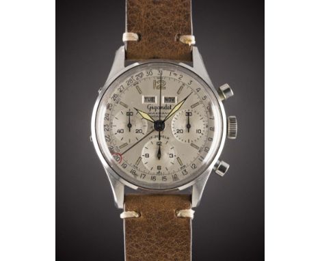 A GENTLEMAN'S STAINLESS STEEL GIGANDET WAKMANN TRIPLE CALENDAR CHRONOGRAPH WRIST WATCH
CIRCA 1960s, REF.&nbsp;5086
Movement:&