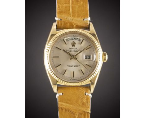 A GENTLEMAN'S 18K SOLID YELLOW GOLD ROLEX OYSTER PERPETUAL DAY DATE WRIST WATCH
CIRCA 1971, REF. 1803 WITH SILVER DIAL
Moveme