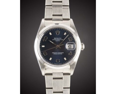 A GENTLEMAN'S STAINLESS STEEL ROLEX OYSTER PERPETUAL DATE BRACELET WATCH
CIRCA 2000, REF. 15200 WITH BLUE DIAL, ACCOMPANIED B