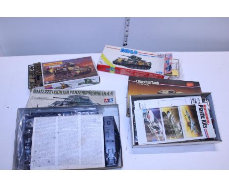 Four assorted military model kits, (boxed as new) 